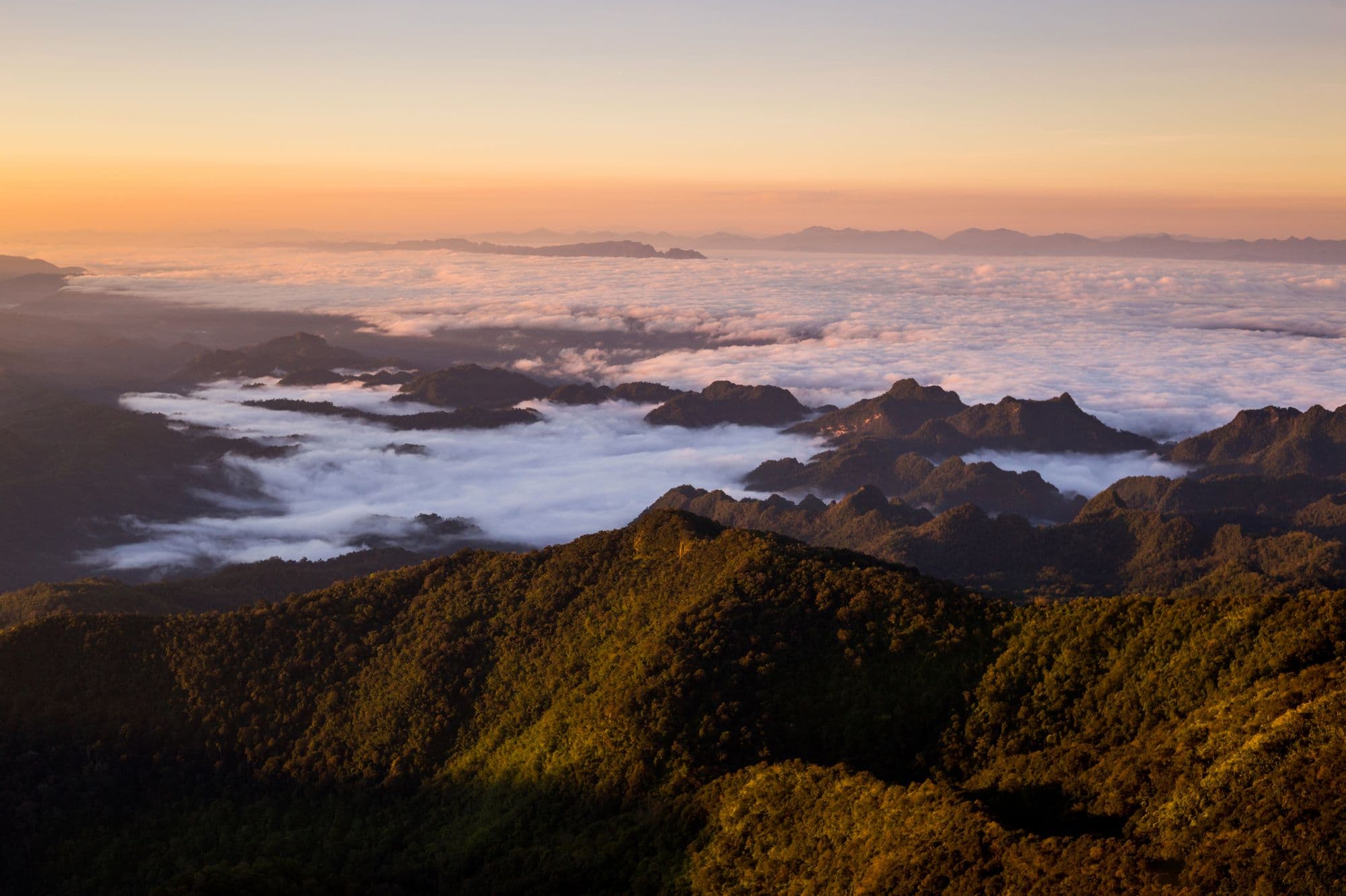beautiful sun rise on top mountain with could